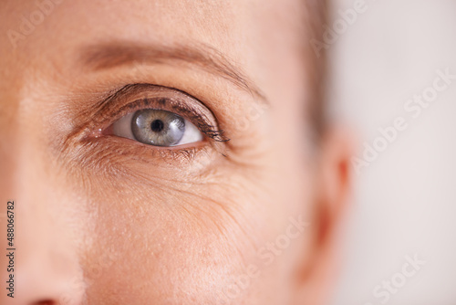 The fight against wrinkles. Closeup studio shot of a beautiful mature womans face. photo