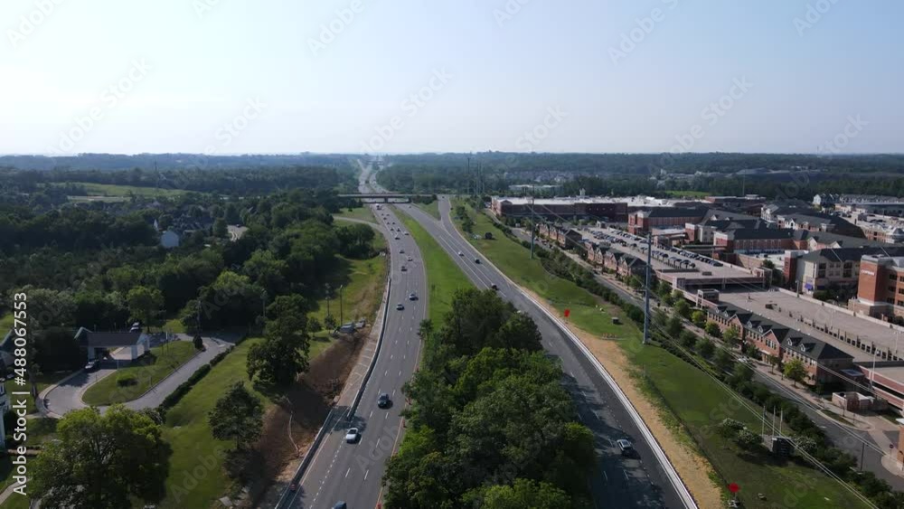 2022 - Excellent aerial view of cars driving down Route 7 in Leesburg, Virginia. 2022 - Excellent aerial view of cars driving down Route 7 in Leesburg, Virginia.