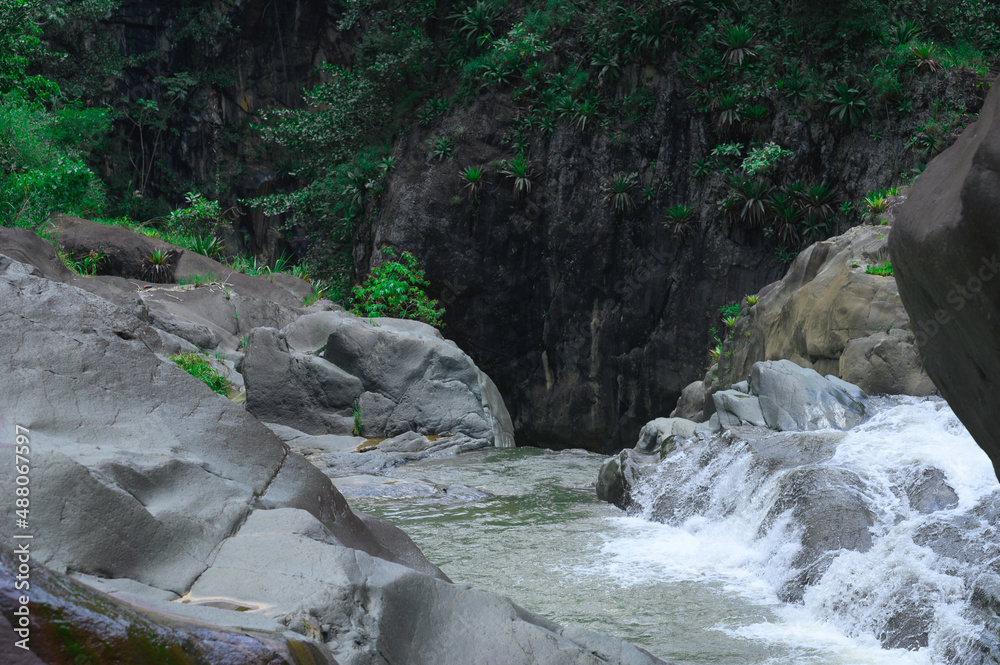 Mountain river among the rocks, the beginning of the waterfall Mountain river among the rocks, the beginning of the waterfall