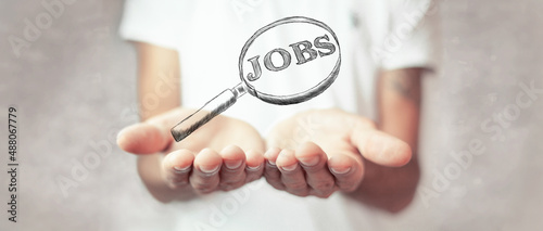 Magnifying glass and the inscription: Job search symbol