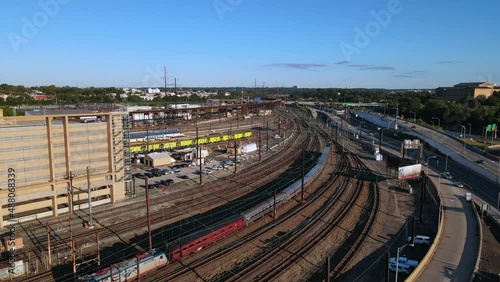 2022 - Excellent aerial view of train tracks near a highway in Philadelphia, Pennsylvania.