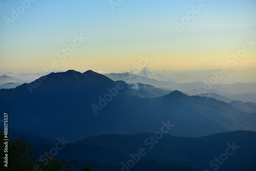mountain peak at sunrise  © tharathip