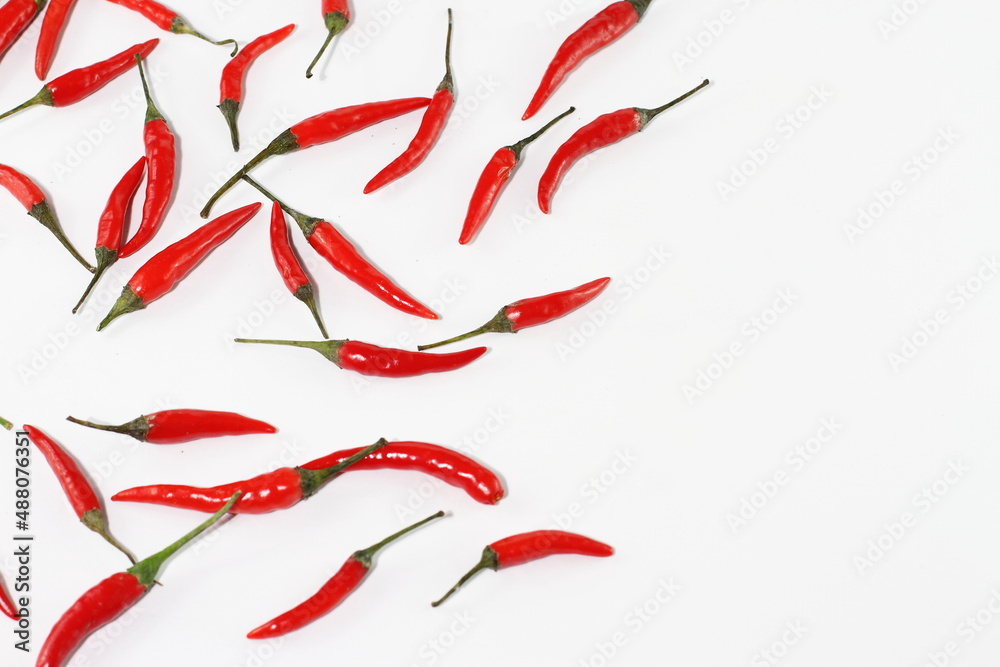 Raw red pepper, bunch of chili pepper on white