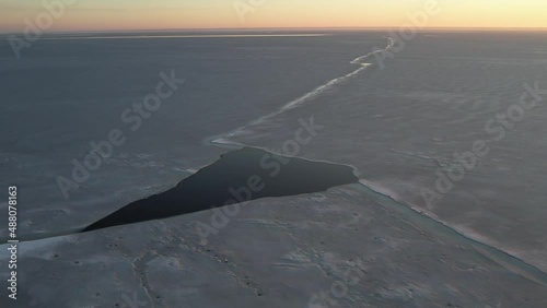 view of the frozen river