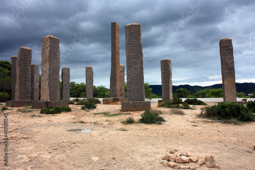 architectural stonehenge particular Ibizan structure of author in an arid clearing on the sea