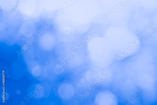 Abstract blurry blue color for background, Blur festival lights outdoor celebration and blue bokeh focus texture decorative design elegant for winner.