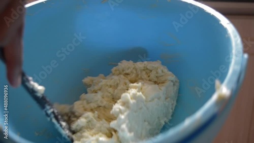 Mixing cake ingeredients in kitchen