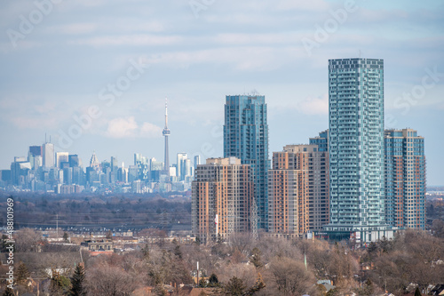 Photography views of downtown Toronto from mimco with snow and trees blue skies lake view an