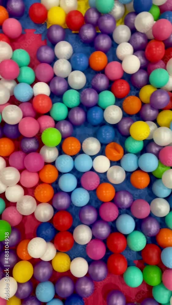 Bright multicolored plastic balls background vertical
Bright multicolored plastic balls background vertical