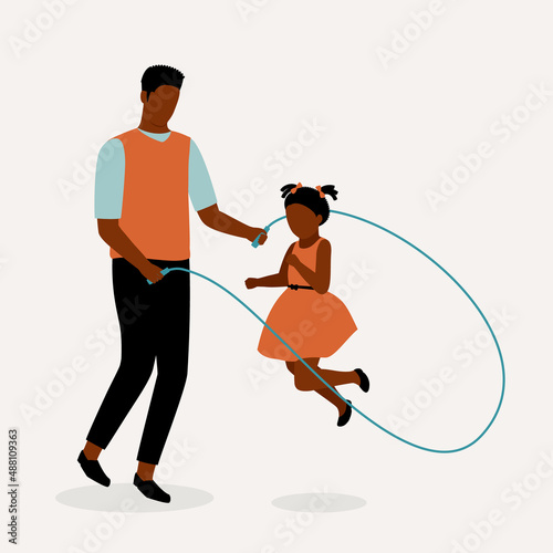 Black Father Playing Jumping Rope With His Daughter.