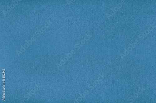 Seamless texture of fabric for upholstery of upholstered furniture in light blue color, natural textiles, woven threads matting, noisy structure