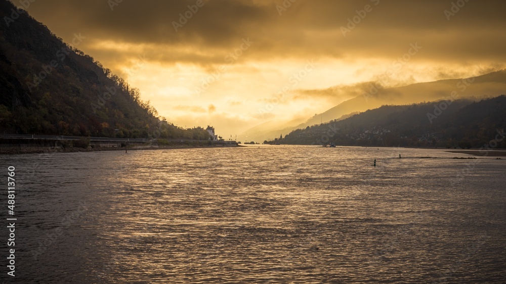 Sunrise on a cloudy day at the River Rhine in Bacharach, Rhineland-Palatine, Germany