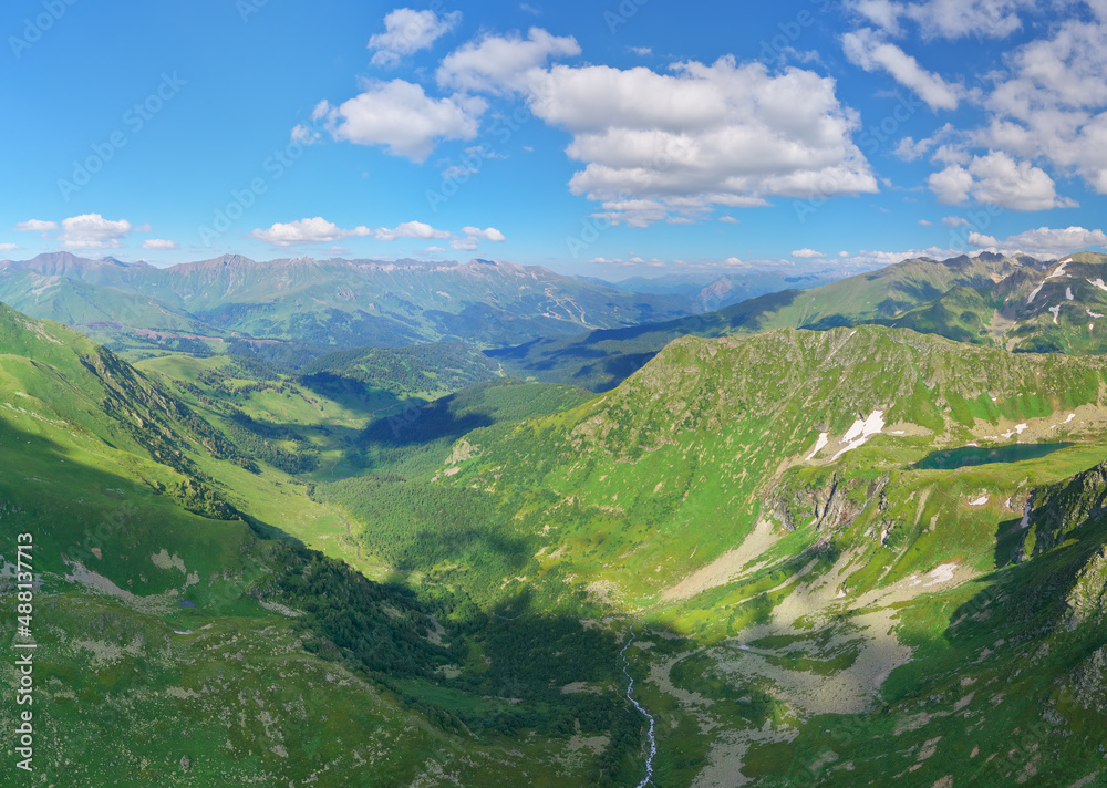 Panorama of green valley of Caucasus mountains
