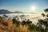 Sea of Fog covers the area on the top of hill Doi Phu Thok, Chiang Khan, Loei, Thailand with background of sunrise on winter. 
