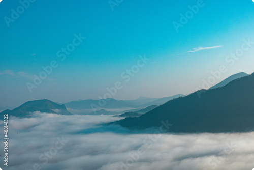 Sea of Fog covers the area on the top of hill Doi Phu Thok  Chiang Khan  Loei  Thailand with background of sunrise on winter. 