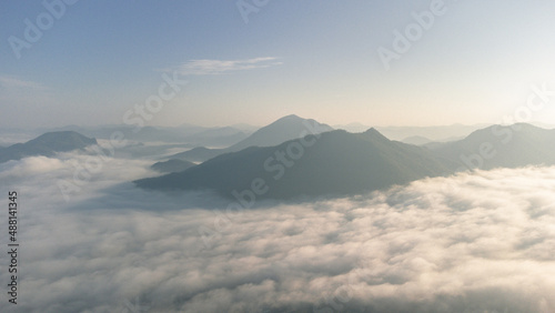 Sea of Fog covers the area on the top of hill Doi Phu Thok, Chiang Khan, Loei, Thailand with background of sunrise on winter. 