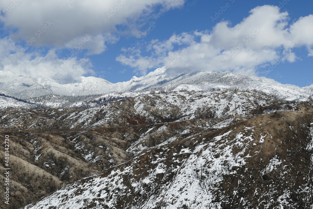The snow-covered San Jacinto Mountains on a winter day, as seen from the Pines to Palms Highway, Southern California, USA.
