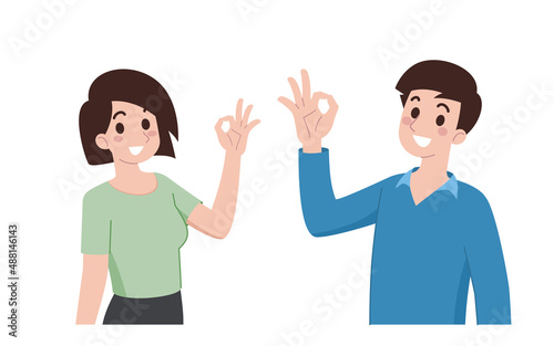 Fototapeta Naklejka Na Ścianę i Meble -  A young man and a woman smile and do the hand gesture ok or feel fine sign. Cartoon characters show their hands to prove the product or goods is good quality for advertising.
