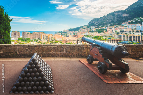 Cannon and cannonballs along Monaco wall ramparts and fort. Montecarlo, Monaco principality photo