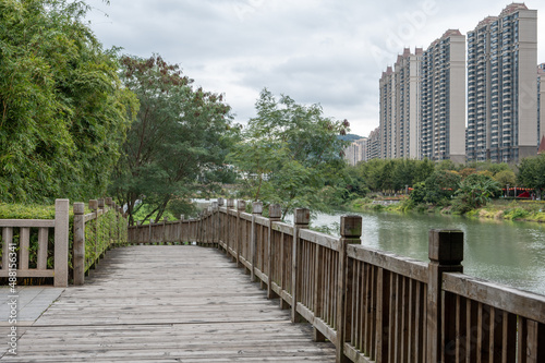 There is a wooden plank road in the park