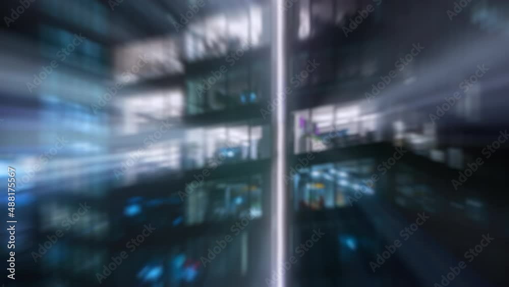 Time lapse bokeh blurred background blinking office windows lights in business center building facade, people working late night. Corporate business. Light in building windows turn on and off