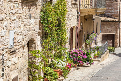 Flowers in ancient street located in Spello village. Umbria Region, Italy. © Paolo Gallo