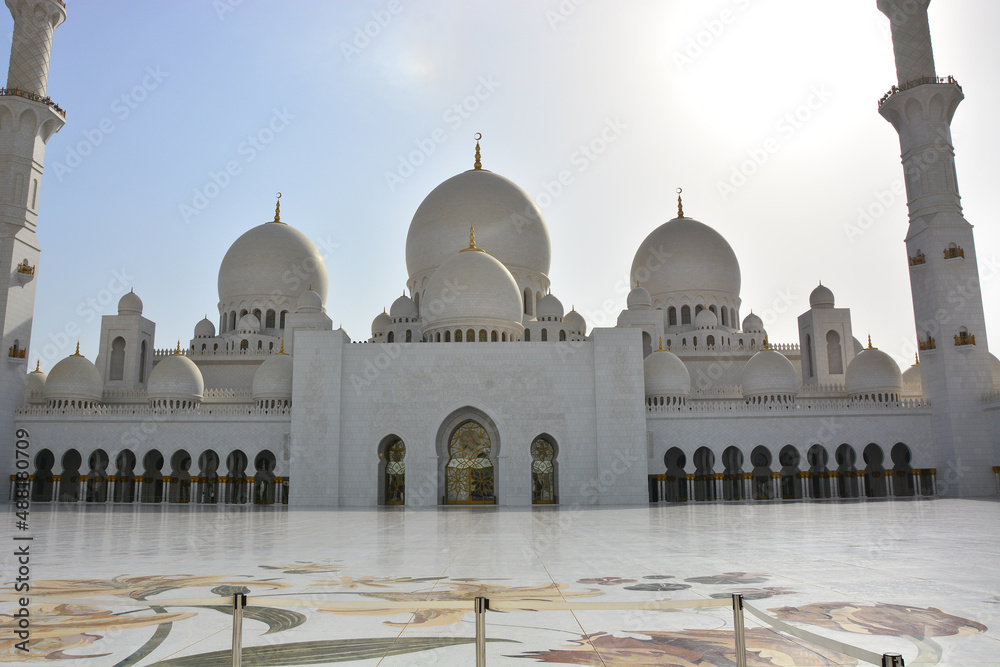 Sheikh Zayed Grand Mosque, courtyard of world's largest mosque located in Abu Dhabi, .in United Arab Emirates; arabesque floral patterns on floor