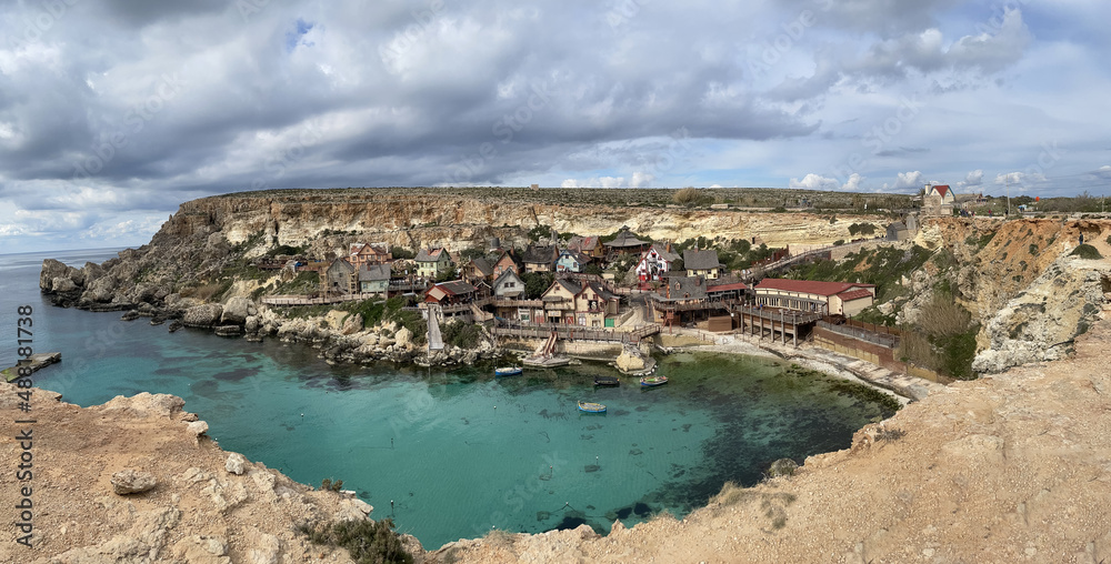 Anchor Bay alongside the former film set for the 1980 film Popeye in Mellieha, Malta.