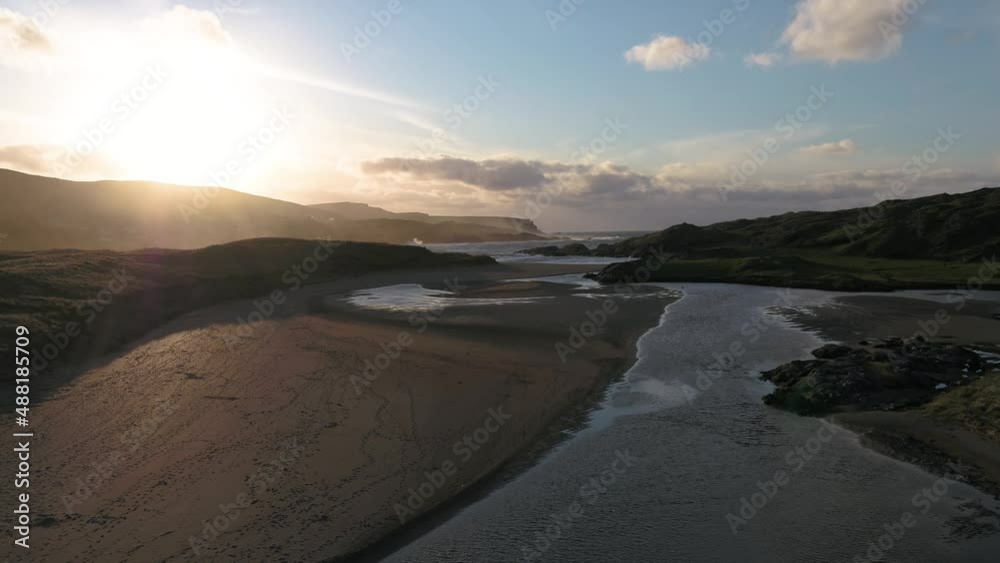 Aerial view of the river Murlin flowing into Glen bay in Glencolumbkille in County Donegal, Republic of Irleand Aerial view of the river Murlin flowing into Glen bay in Glencolumbkille in County Donegal, Republic of Irleand