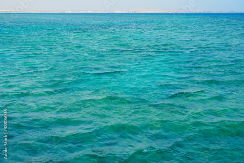 The surface of the water of the Red Sea with a horizon in the background.