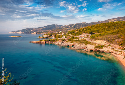 Picturesque summer scene of Zakynthos island. Colorful seascape of Ionian Sea, Mikro Nisi village location, Greece, Europe. Traveling concept background.
