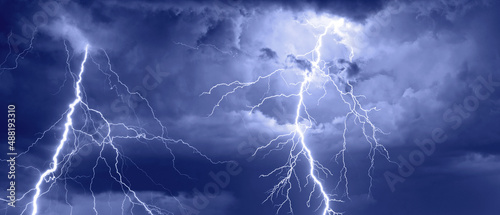 Thunder and lightning during summer storm at night