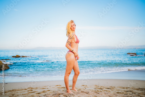 blonde woman in bikini on the beach