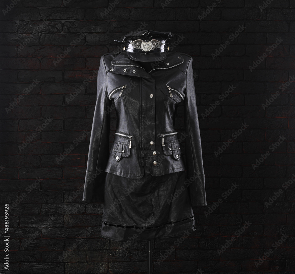 Naklejka premium black leather jacket and black leather skirt