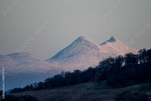 A snow covered Ben Cruachan in the Scottish Highlands photographed from the Isle of Mull photo