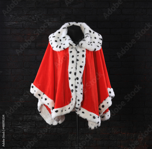 red royal robe on black background