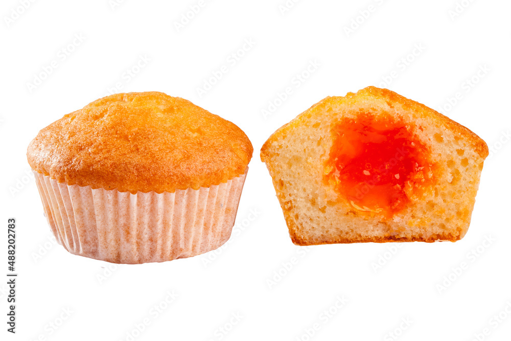 Soft and moist muffin with apricot jam filling isolated on white Soft and moist muffin with apricot jam filling isolated on white
