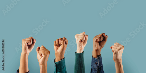 Social Activism and Movement. Group of People Raised Up Hands. Protest, Mob, Expression and Strike Concept photo