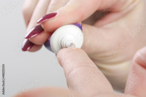 Wallpaper Mural Close up image of hands with ointment tube. Skin care and health care concept.	 Torontodigital.ca