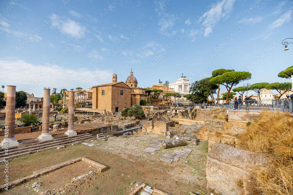 Scenic view on ruins of Roman Forum with Church of Saints Luke and Martina. Rome cityscape on a sunny day. Concept of historical landmarks and travel Italy