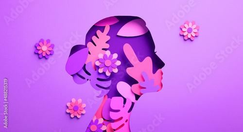 International Womens Day poster with woman silhouette and floral ornaments in paper cut 3D illustration. Female face flyer for feminism, independence, empowerment and Women's day equality concept