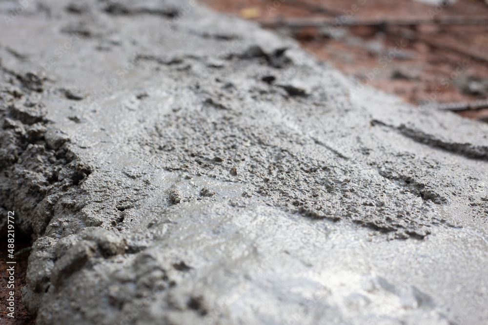 Close-up of a concrete mix. Construction concept. Close-up view of concrete mix with space for text. Close-up of a concrete mix. Construction concept. Close-up view of concrete mix with space for text.