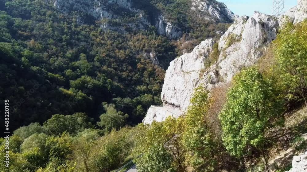 1 a mountainous part where the highway can be seen among the treetops and the great canyon 1 a mountainous part where the highway can be seen among the treetops and the great canyon