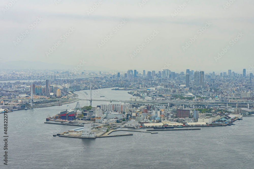 Overcast aerial view of Osaka port cityscape