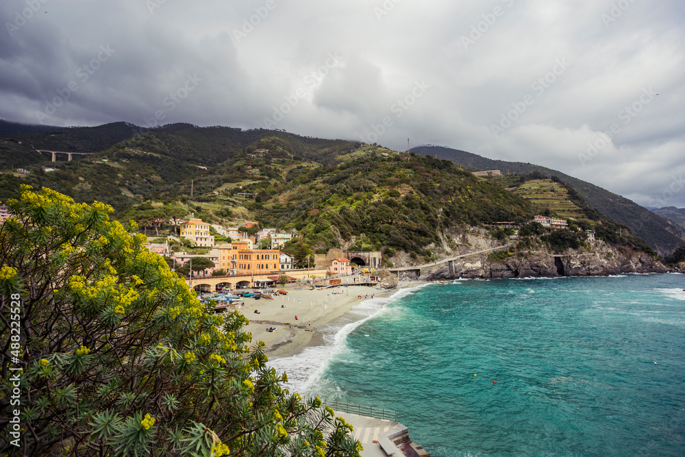 view of the coast of the sea near the town of monterosso in italy