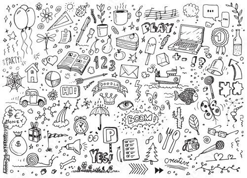 Various vector hand drawn doodles on white paper