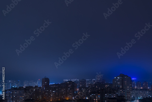 Wallpaper Mural View of the night city in light fog from the top floor of a highrise in Poznyaky, Kyiv, Ukraine. Torontodigital.ca