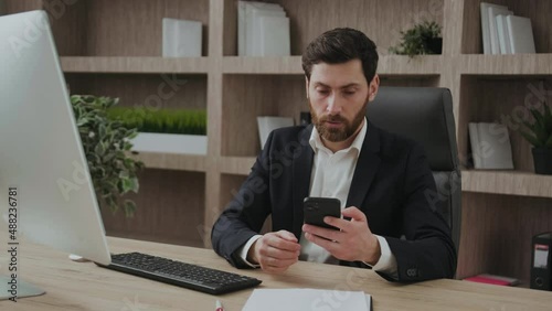 Angry businessman stressed about smartphone problem at workplace, frustrated executive with the Internet or phone bugs