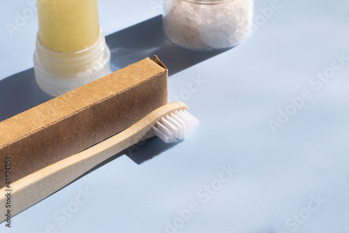 Wallpaper Mural Bamboo toothbrush on a blue background. Wooden eco-friendly toothbrush.  Torontodigital.ca