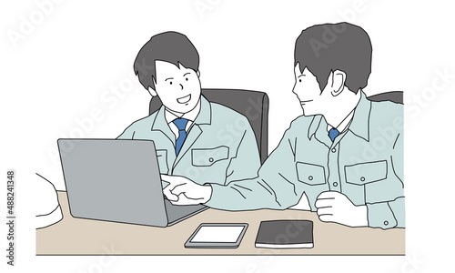 PCと作業服を着たビジネスマンの男性達